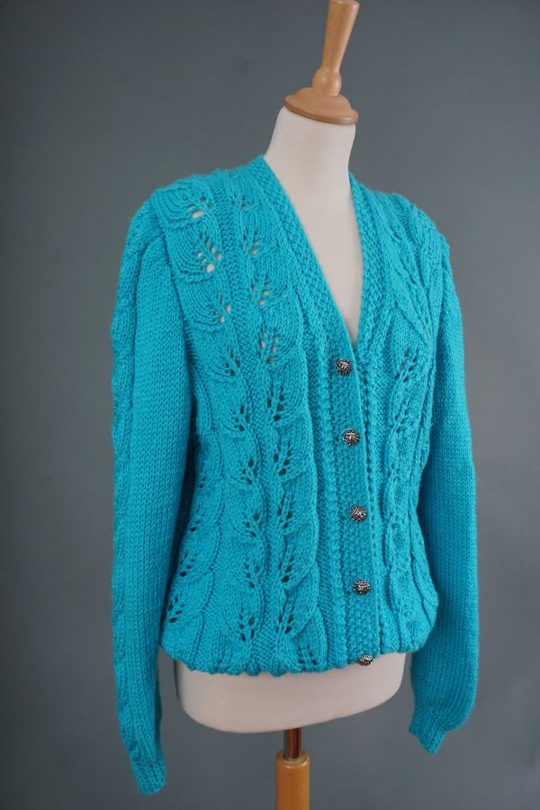 Turquoise sweater with silver buttons Price